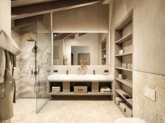 This luxurious bathroom boasts a spacious design with a double vanity, a walk-in shower, and ample storage.