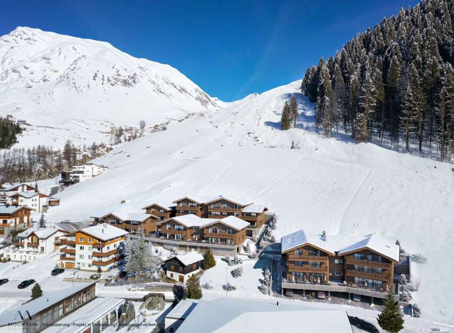 Nestled in a stunning alpine setting, this luxurious chalet development offers breathtaking mountain views and ski-in/ski-out access.