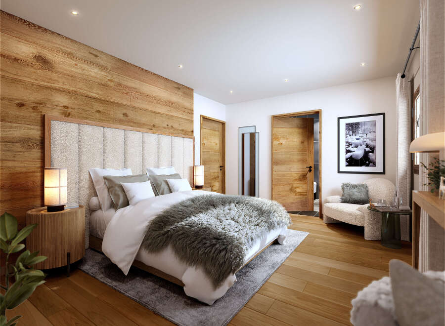 Luxurious mountain retreat boasting a stunning master bedroom with wood paneling, plush bedding, and a cozy seating area.