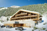Luxury chalet nestled in a snowy mountainside, offering breathtaking views and modern amenities.
