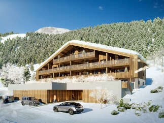 Luxury chalet nestled in a snowy mountainside, offering breathtaking views and modern amenities.