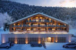 Luxury chalet nestled in a snowy mountainside, offering stunning views and modern amenities.