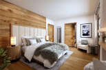 Luxurious mountain retreat boasting a stunning master bedroom with wood paneling, plush bedding, and a cozy seating area.