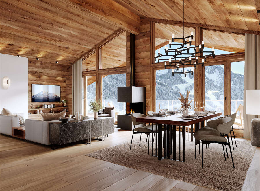 This stunning chalet boasts a spacious open-plan living area with floor-to-ceiling windows offering breathtaking mountain views.
