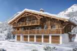 This stunning chalet boasts a prime location in a snow-covered mountain setting.