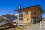 Discover this stunning modern chalet nestled in the heart of the Alps, offering breathtaking mountain views.