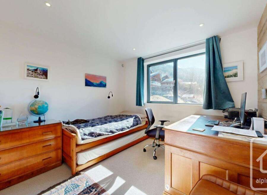 Discover the charm of this inviting bedroom, perfect for relaxation and productivity.