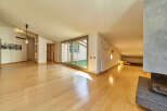 This stunning property boasts a spacious open-plan living area with gleaming hardwood floors and large windows that flood the room with natural light.