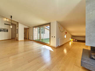 This stunning property boasts a spacious open-plan living area with gleaming hardwood floors and large windows that flood the room with natural light.