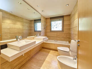 Luxurious bathroom with modern fixtures and finishes.