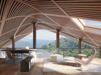 Mountain view home office with stunning wooden ceilings and large windows.