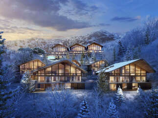 Luxury ski-in/ski-out homes nestled in a snowy mountainside.