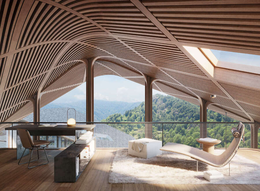 Mountain view home office with stunning wooden ceilings and large windows.