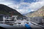 Modern mountainside development with stunning valley views.