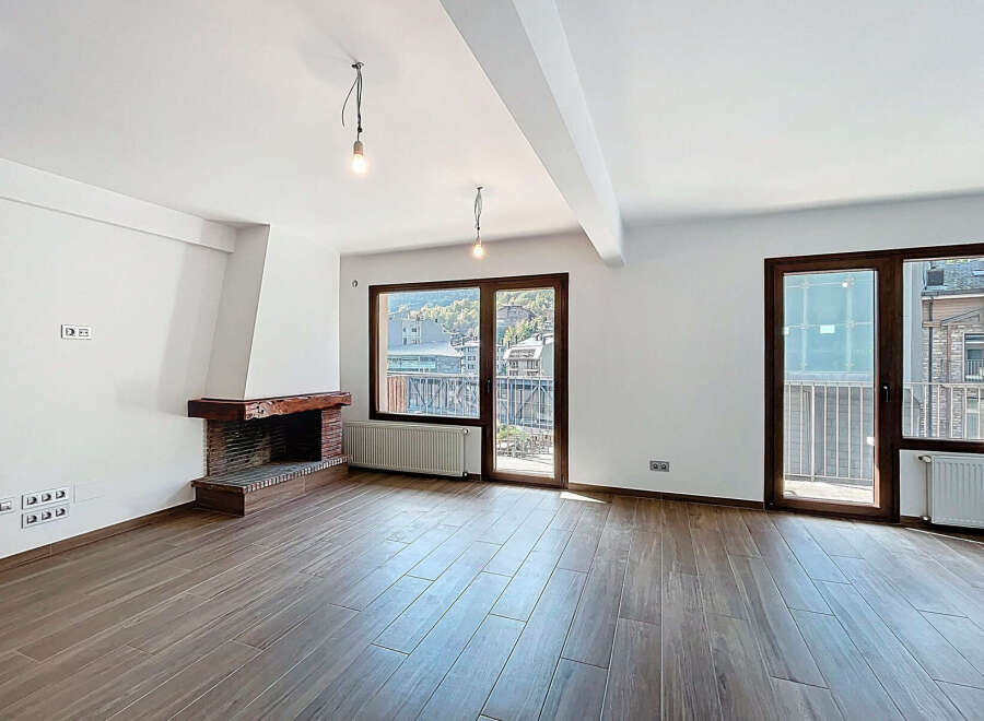 Discover this stunning property featuring a cozy fireplace and elegant wooden floors.