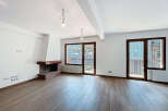 Discover this stunning property featuring a cozy fireplace and elegant wooden floors.