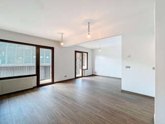 Discover this bright and airy living space, featuring stunning hardwood floors and ample natural light.