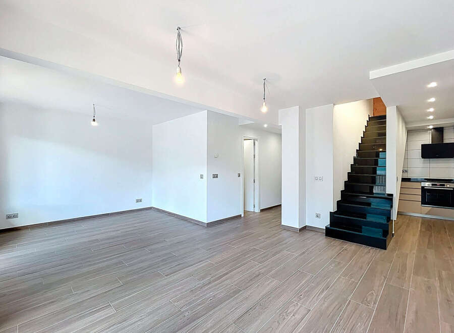 Discover this stunning modern property featuring a bright and airy open-plan living space.