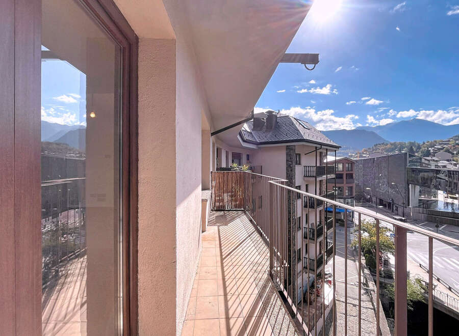 Enjoy breathtaking mountain views from this stunning balcony.
