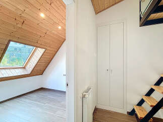 Discover this charming property featuring a unique architectural design.