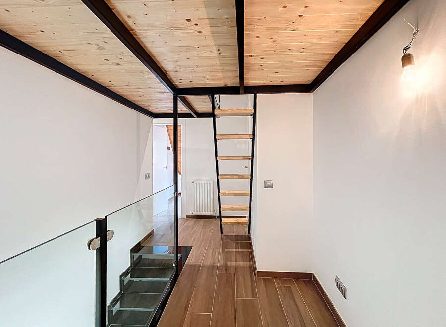 Discover this stunning property featuring a modern interior design with a unique loft space.