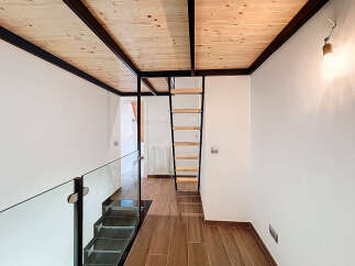 Discover this stunning property featuring a modern interior design with a unique loft space.
