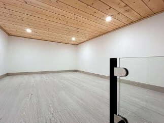 This stunning property boasts a modern interior with a warm and inviting atmosphere.