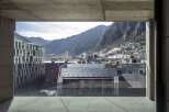 Modern apartment balcony with breathtaking mountain views.