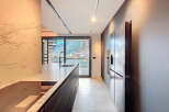 Modern kitchen with stunning mountain views.