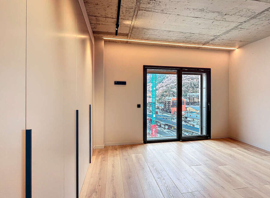 Modern apartment boasting sleek built-in wardrobes and stunning views.