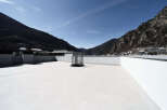This stunning rooftop terrace offers breathtaking panoramic views of the mountains and city.