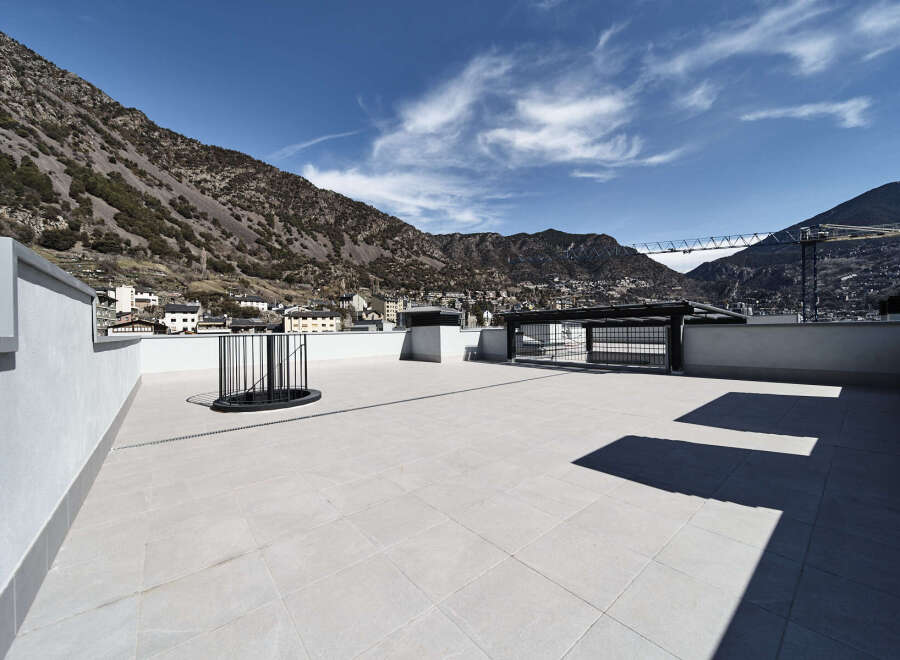 This stunning rooftop terrace offers breathtaking mountain views and a spacious, sun-drenched patio perfect for relaxation or entertaining.