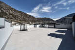 This stunning rooftop terrace offers breathtaking mountain views and a spacious, sun-drenched patio perfect for relaxation or entertaining.