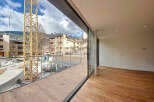 Modern apartment with stunning mountain views and a spacious balcony.