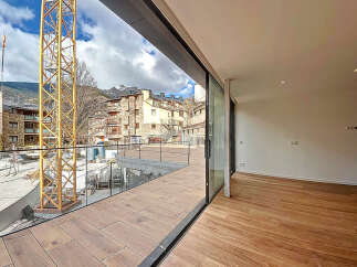 Modern apartment with stunning mountain views and a spacious balcony.