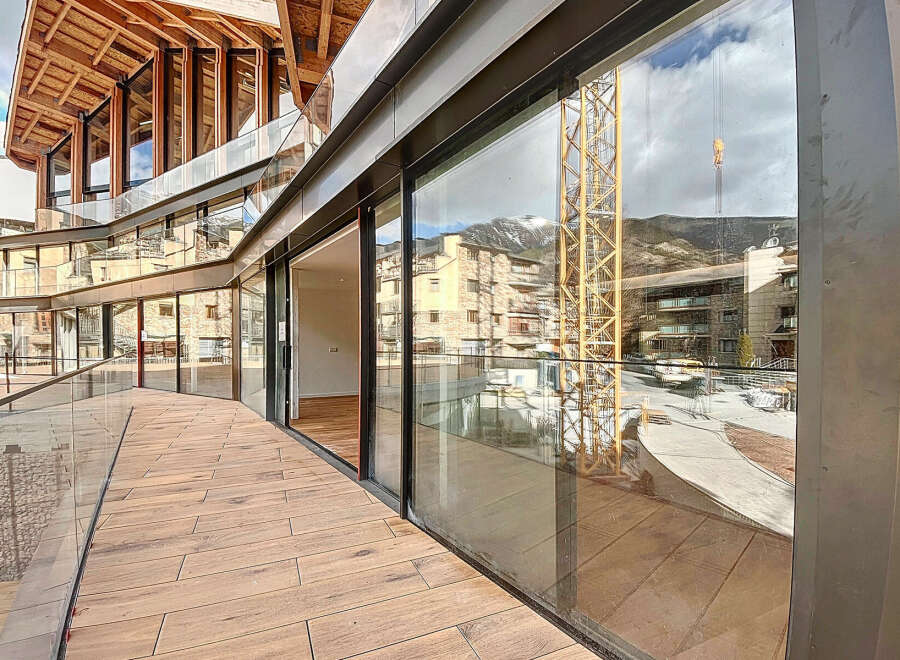 Modern apartment with stunning mountain views and a spacious balcony.