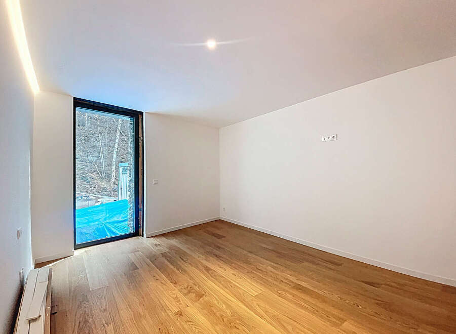 This stunning property boasts a spacious, bright room with gleaming hardwood floors and large windows offering abundant natural light.