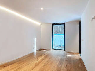 This stunning property boasts a bright and airy interior with sleek, modern finishes.
