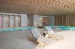 Indulge in luxury at this stunning property featuring a tranquil indoor pool and spa.
