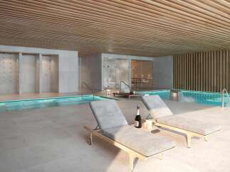 Indulge in luxury at this stunning property featuring a tranquil indoor pool and spa.