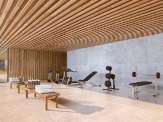 Luxury home gym with state-of-the-art equipment and stunning views.