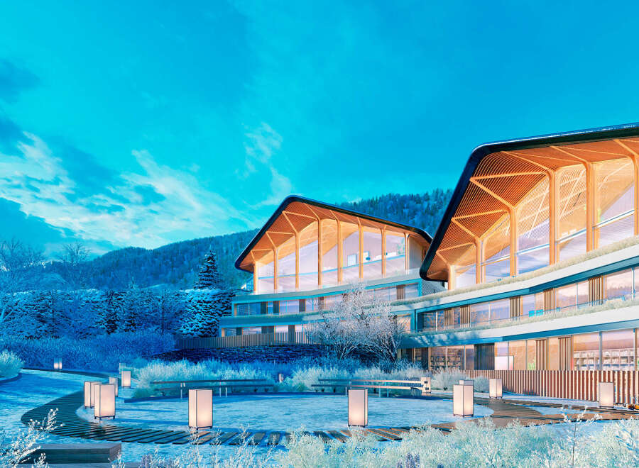 Luxury apartments nestled in a snowy mountainside setting.