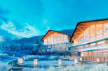 Luxury apartments nestled in a snowy mountainside setting.