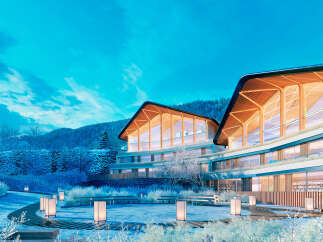 Luxury apartments nestled in a snowy mountainside setting.