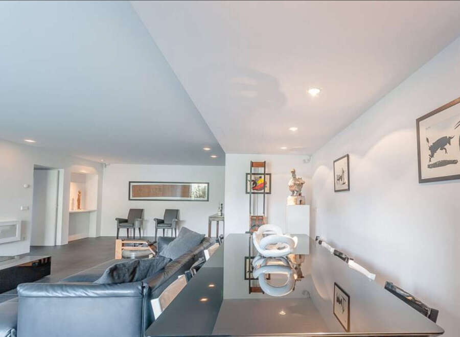 This stunning property boasts a sleek, modern design with an open-plan living area perfect for entertaining.