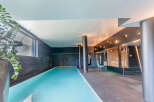 Indulge in luxury with this stunning indoor pool and spa.