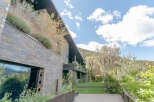 This stunning property boasts a modern design with luxurious finishes and breathtaking mountain views.