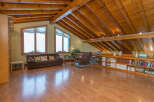 This stunning attic conversion boasts a beautiful wooden beam ceiling and gleaming hardwood floors.