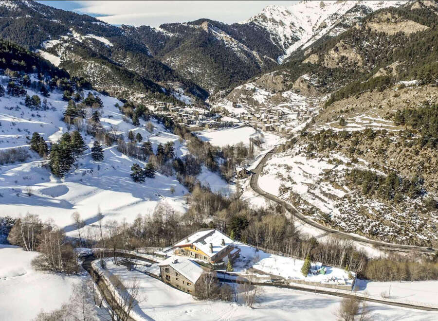 Nestled in a stunning snow-covered mountain valley, this charming property offers breathtaking views and serene surroundings.