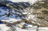 Nestled in a stunning snow-covered mountain valley, this charming property offers breathtaking views and serene surroundings.